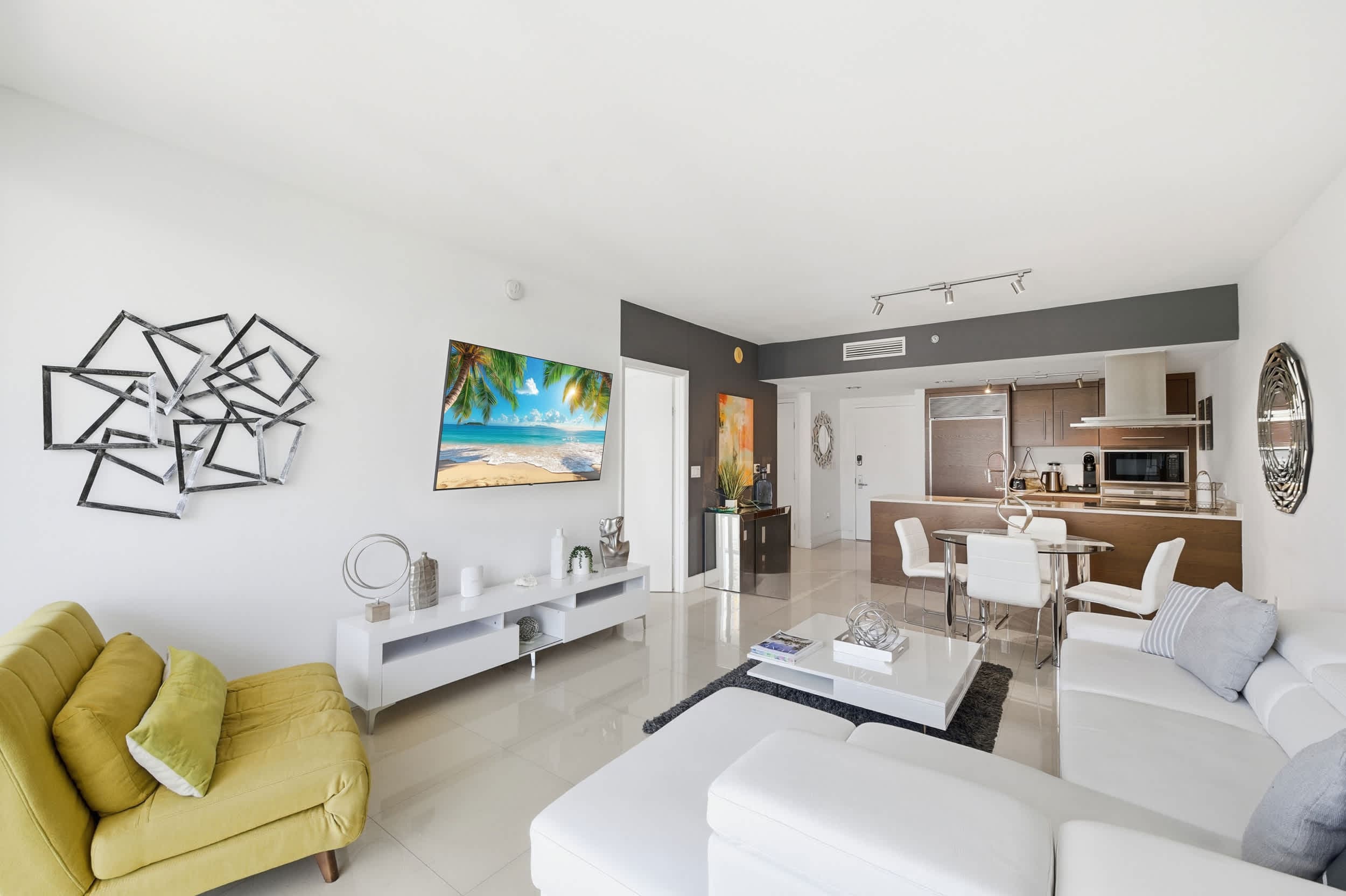 Living room with a sofa and television.