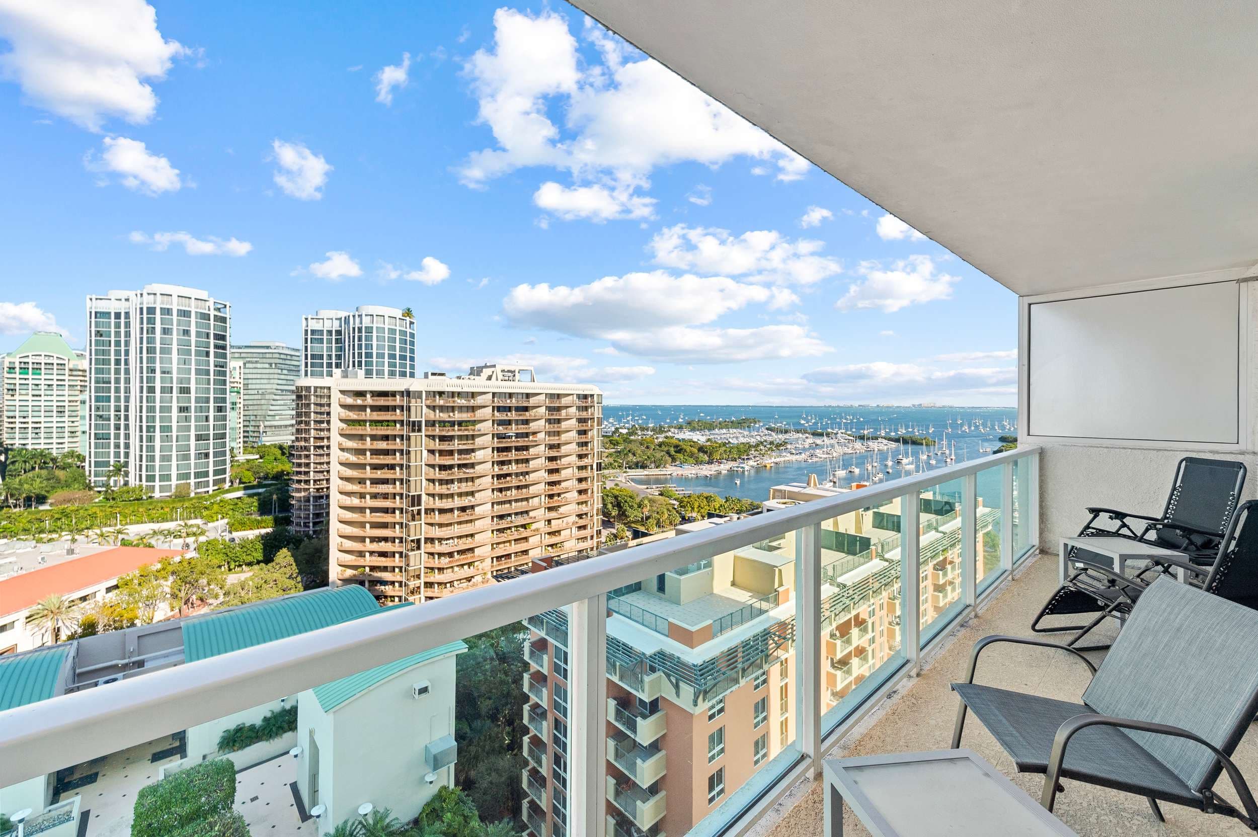Balcony with seating and views of the bay.