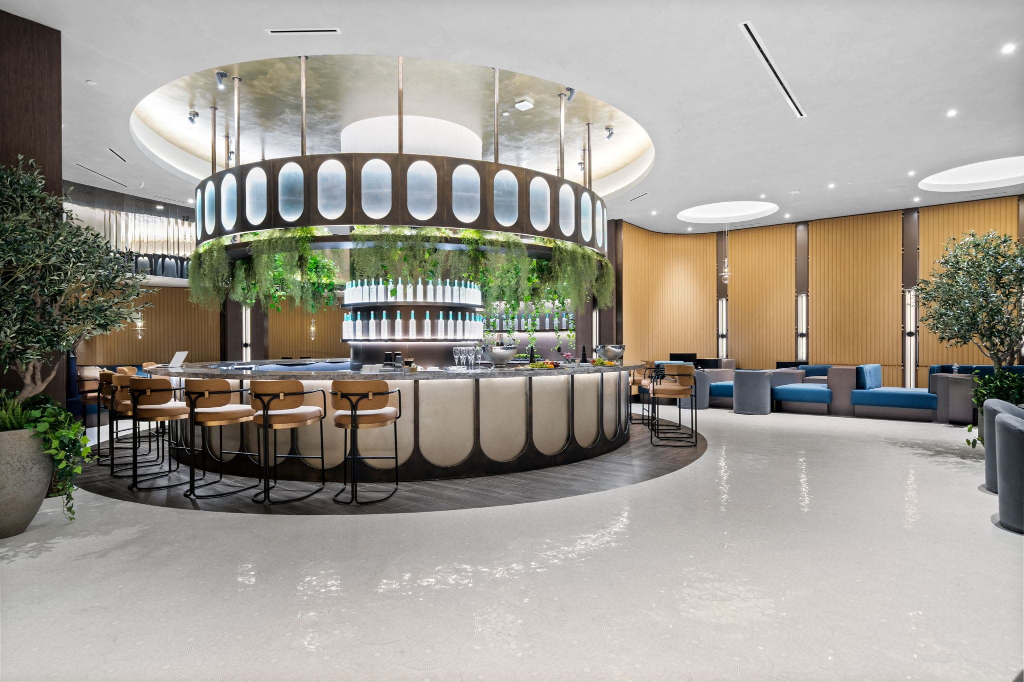 Circular bar with stools and curved seating.