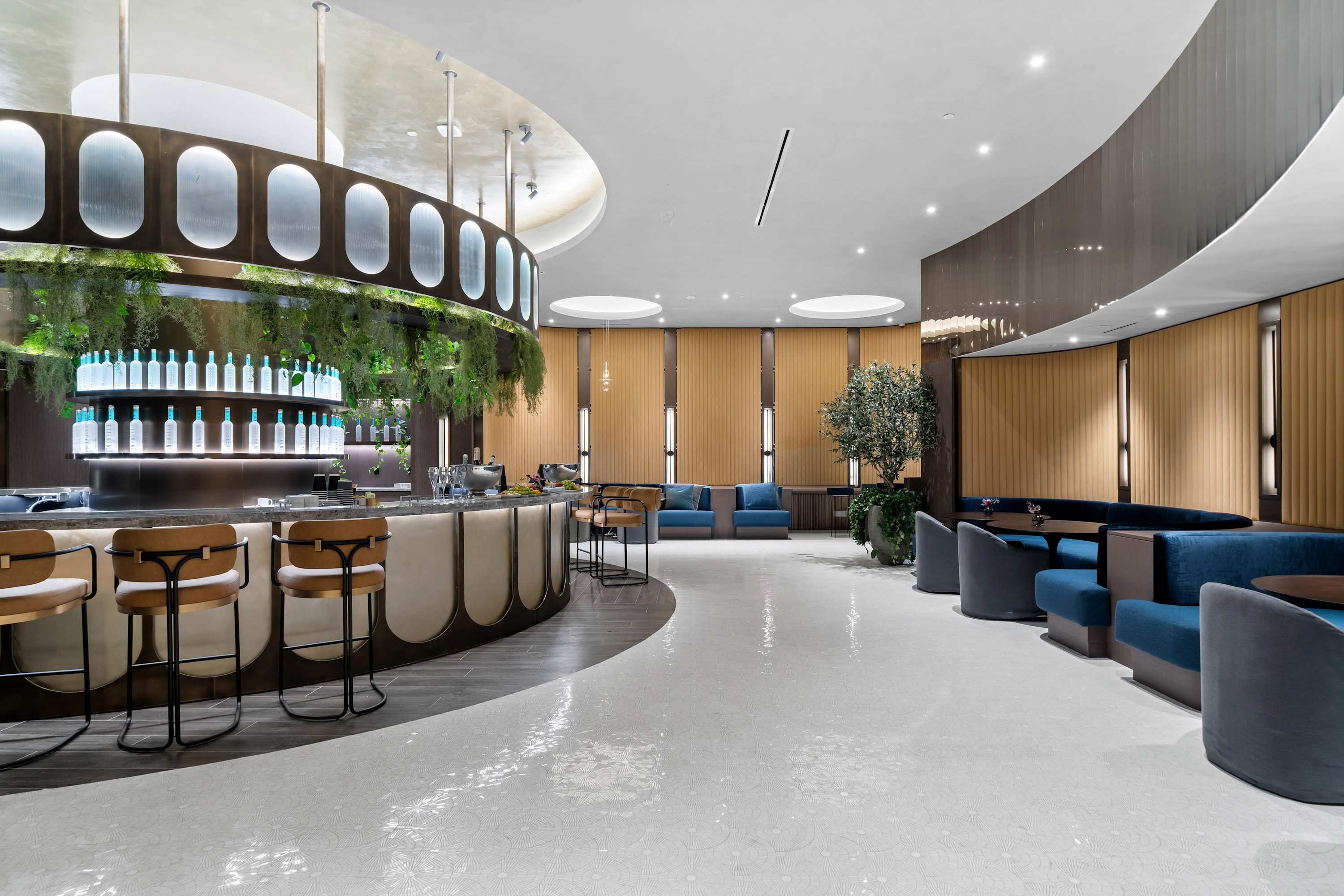 Circular bar with stools and curved seating.