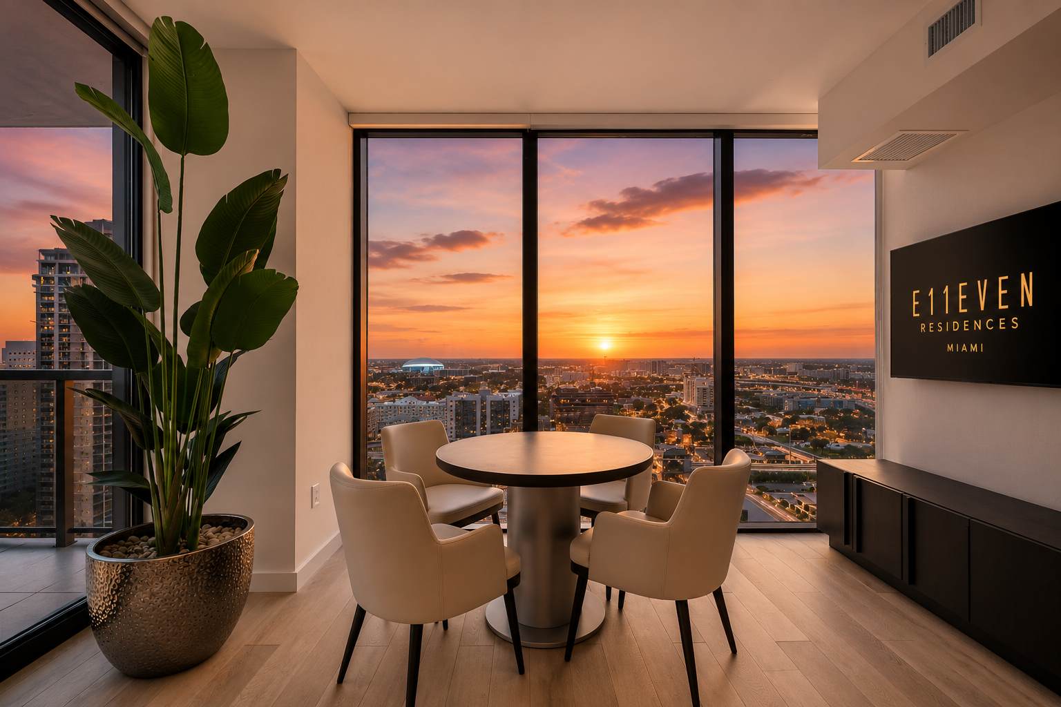 Dining table with chairs beside the living area.