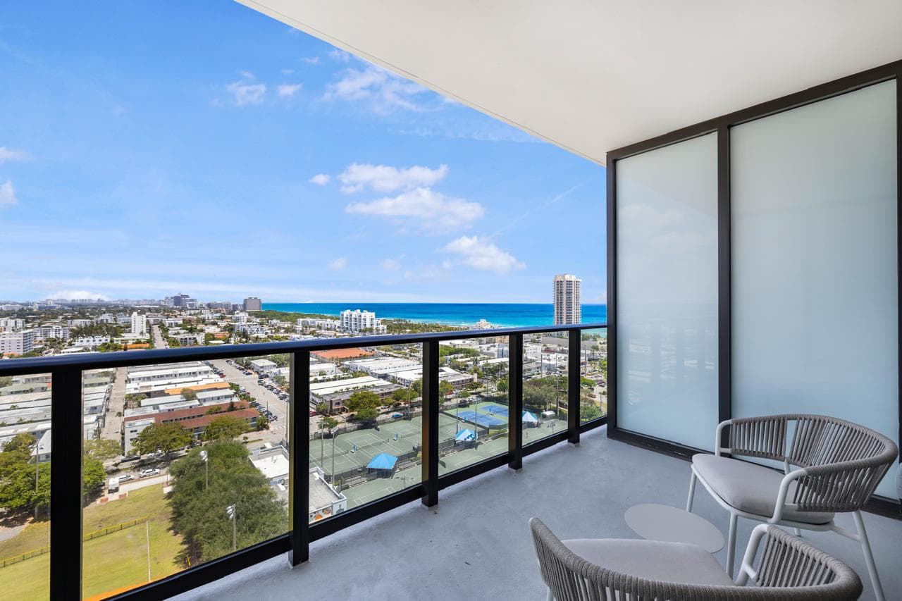 Balcony seating overlooking the coastline.