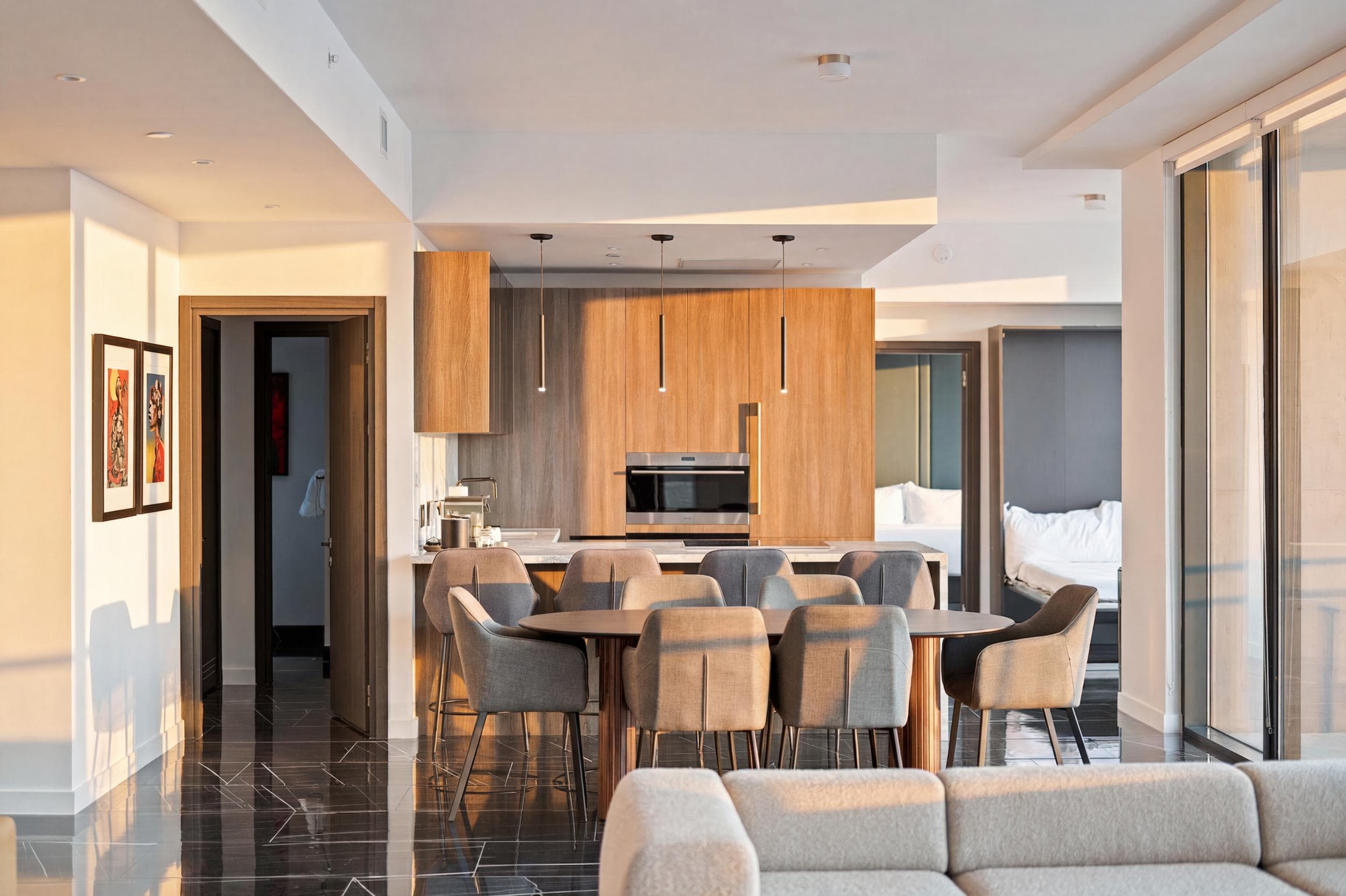 Dining table beside the open kitchen.