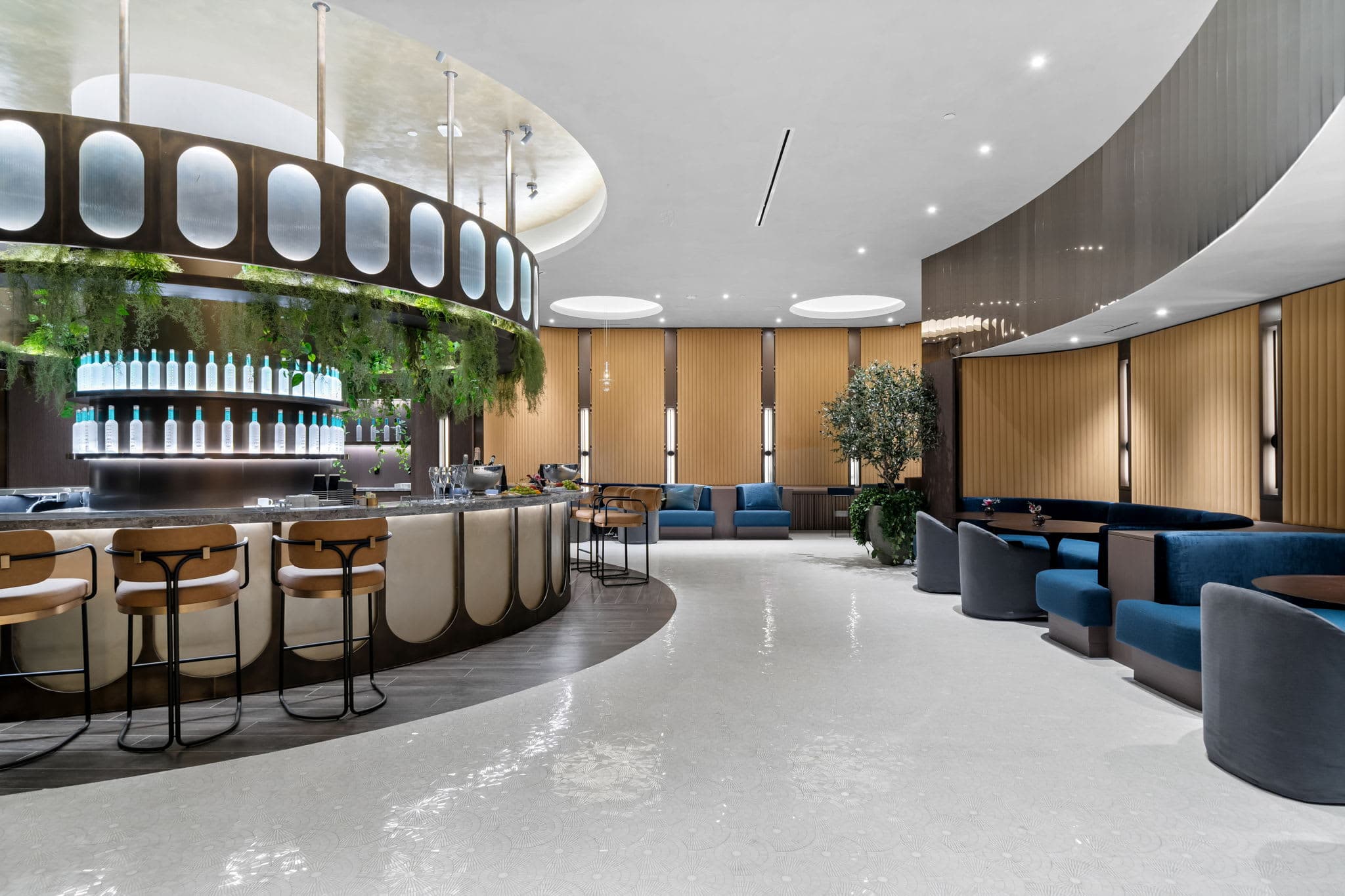 Circular bar with stools and curved seating.