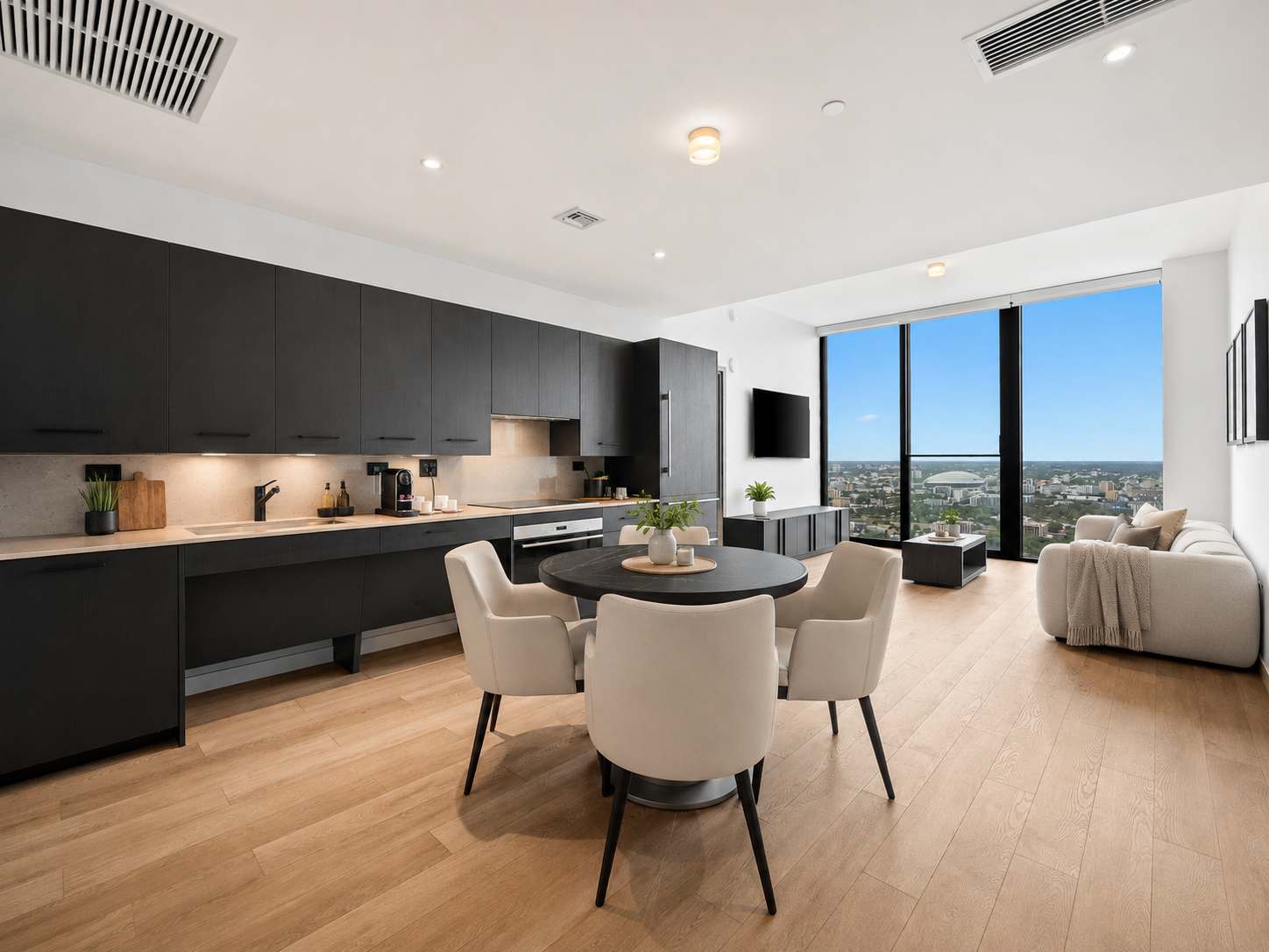 Dining table beside the open kitchen.