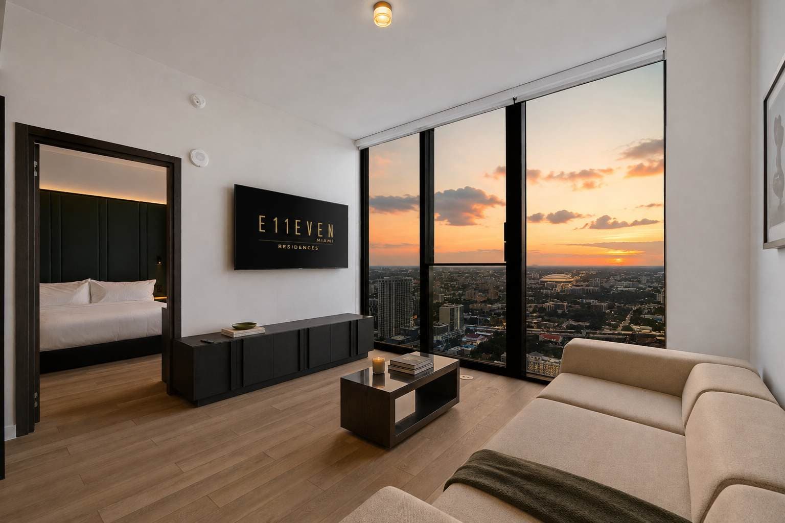 Living room overlooking the city at sunset.