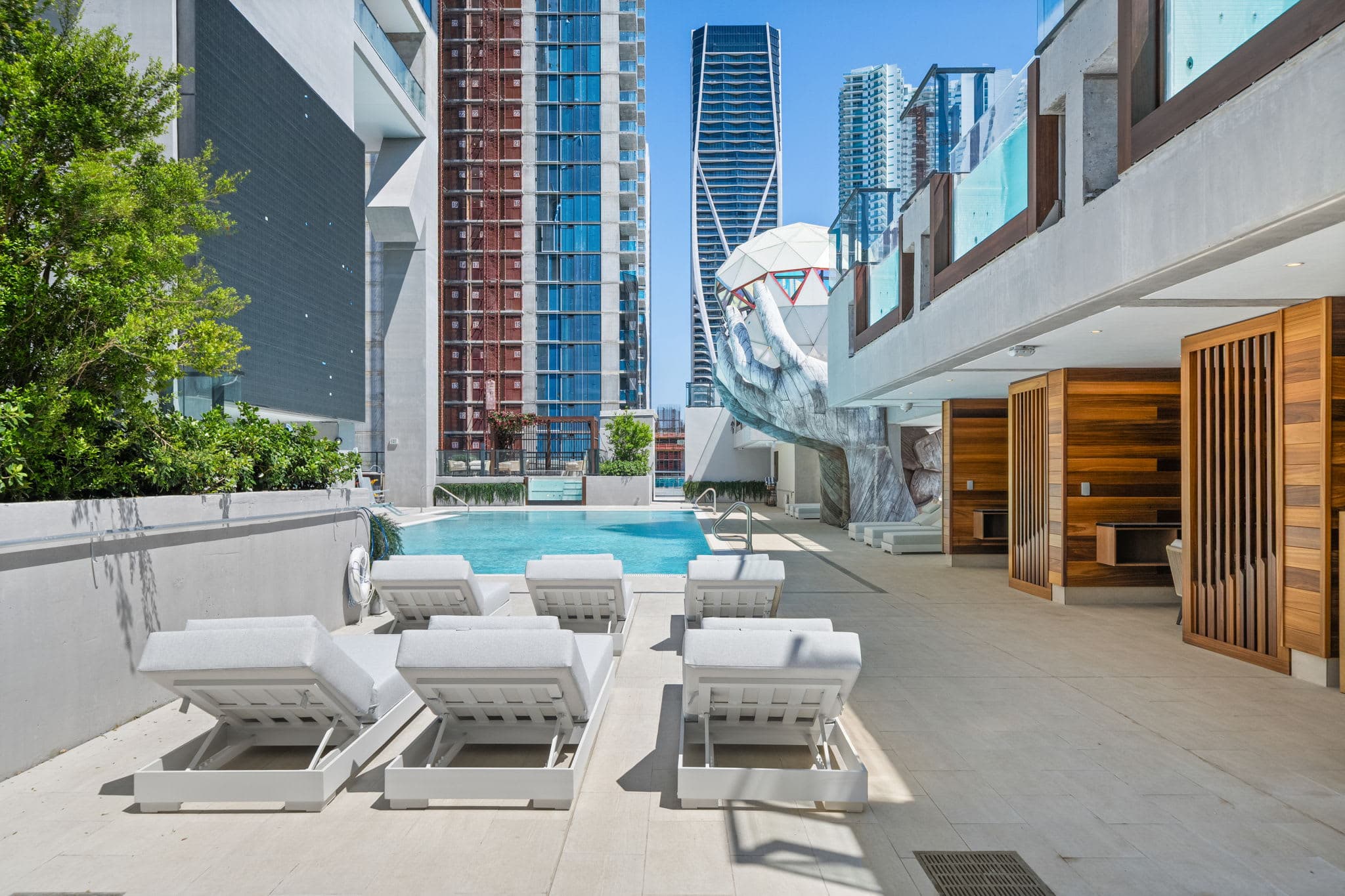 Sun loungers arranged on the pool deck.