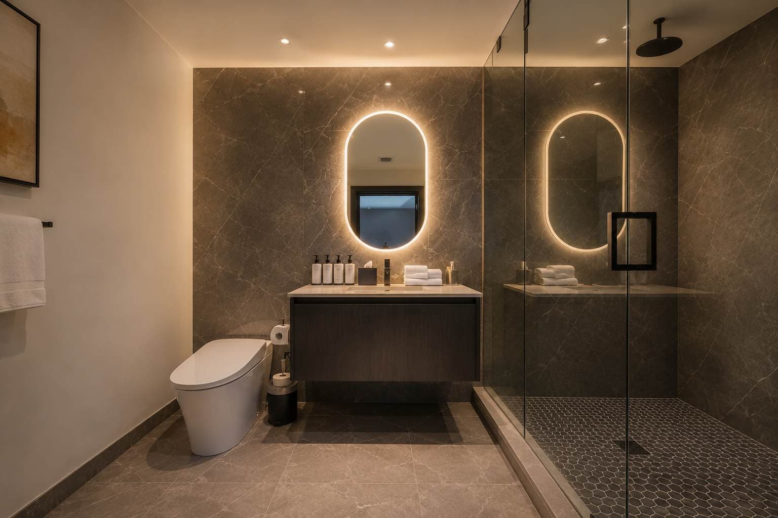 Bathroom with a floating vanity and glass shower.