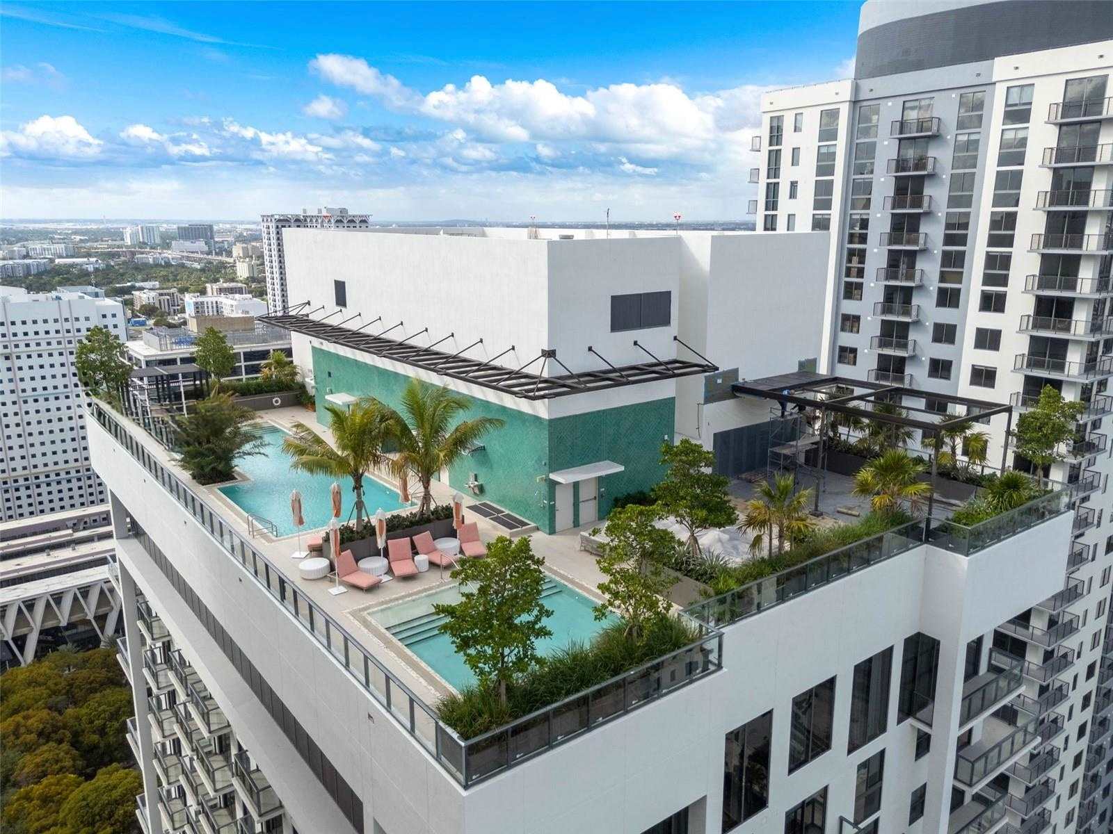 The rooftop pool terrace at The Crosby, Miami Worldcenter