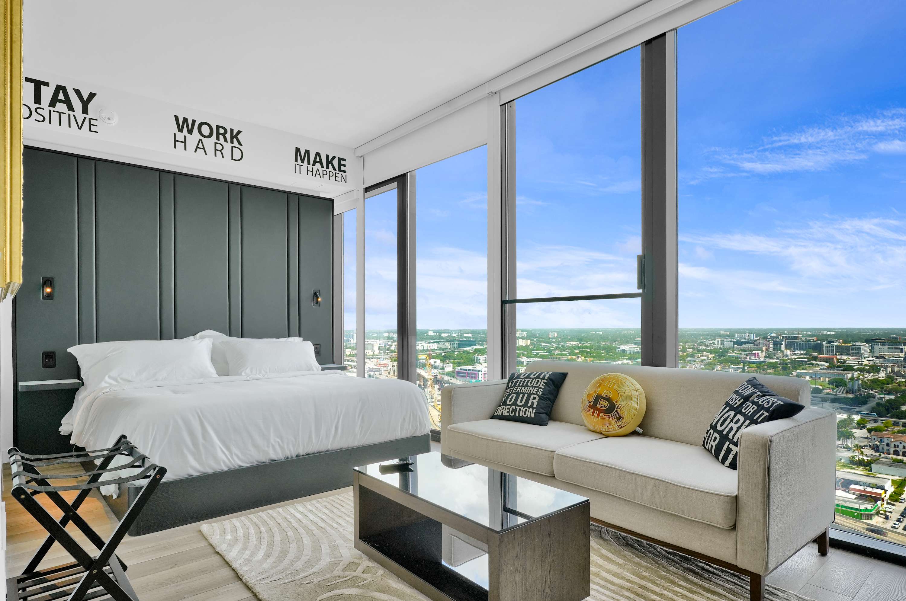 Studio bedroom with a sofa and coffee table.