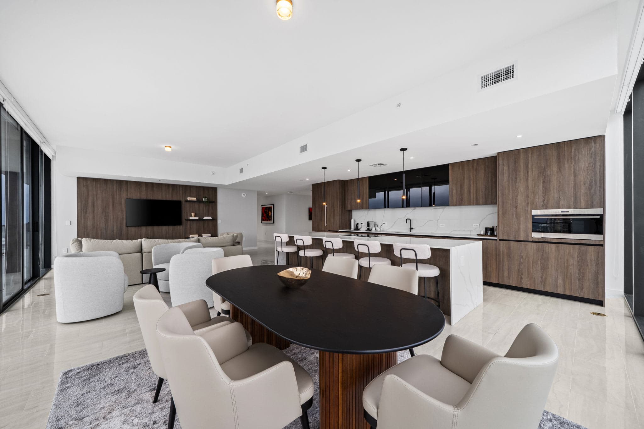 Dining table beside the open kitchen.